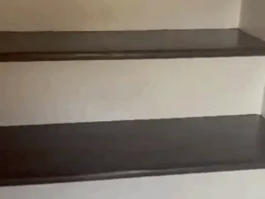 Staircase refinished to match hardwood floor renovation.