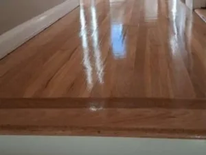 hardwood floor restoration upper hallway with glossy finished floors